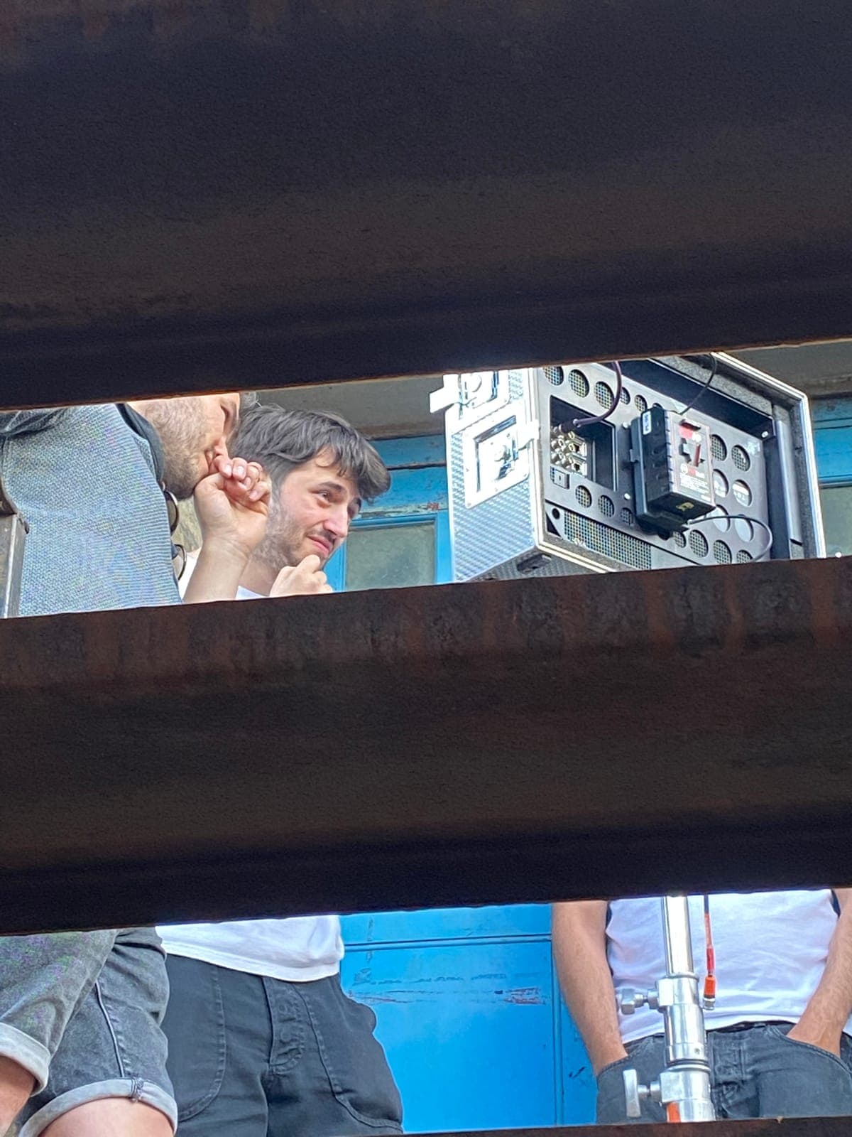 The video village glimpsed through set scaffolding